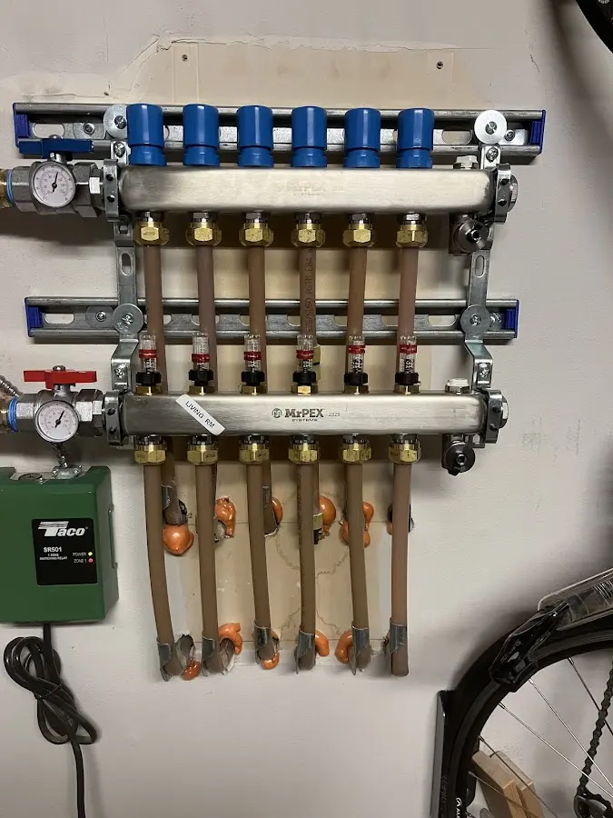 Plumber performing Water Heater Repair at a residential property in Peotone